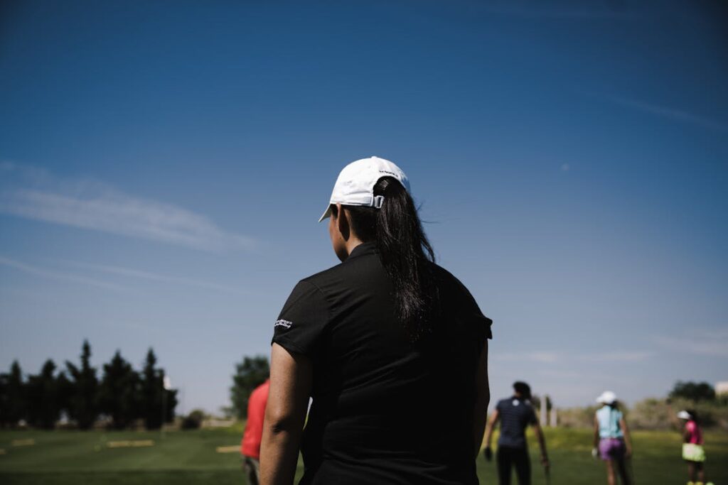 Golfer hitting powerful drive on the course